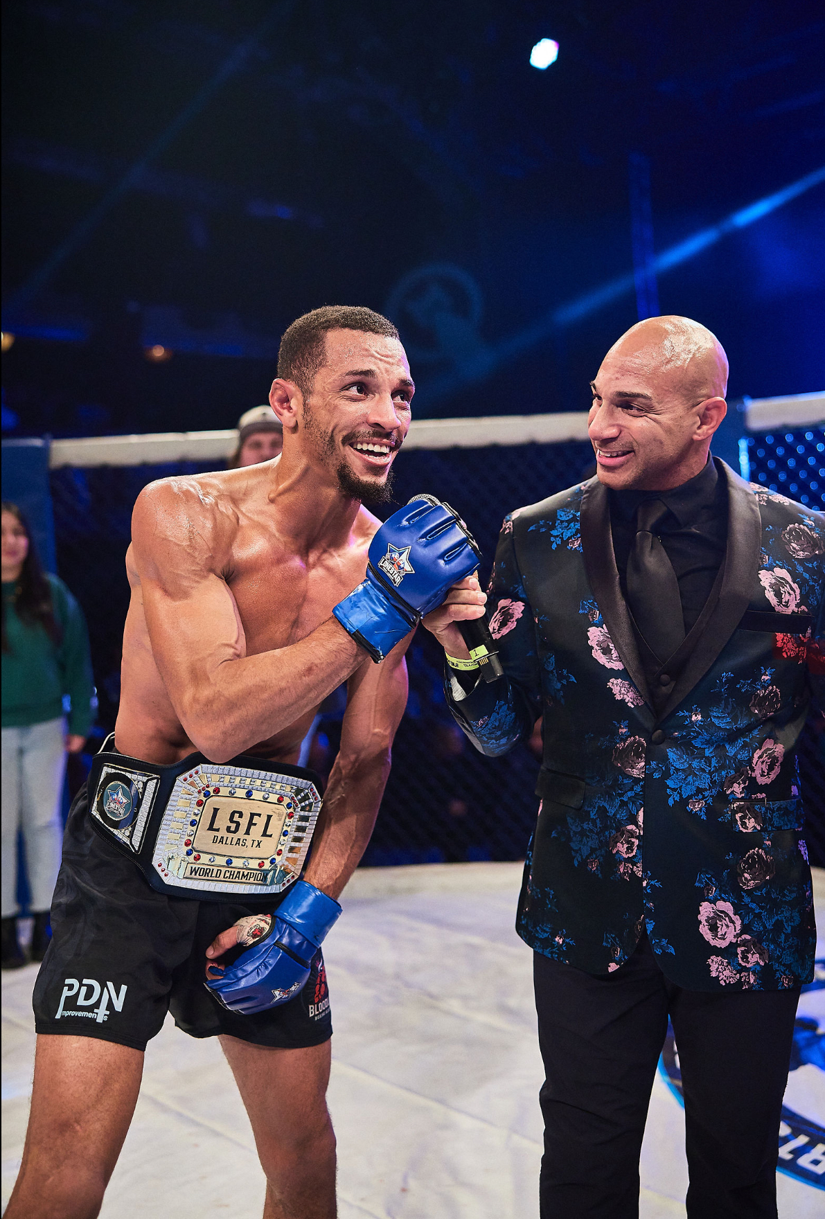 LSFL 2 champion with belt and announcer