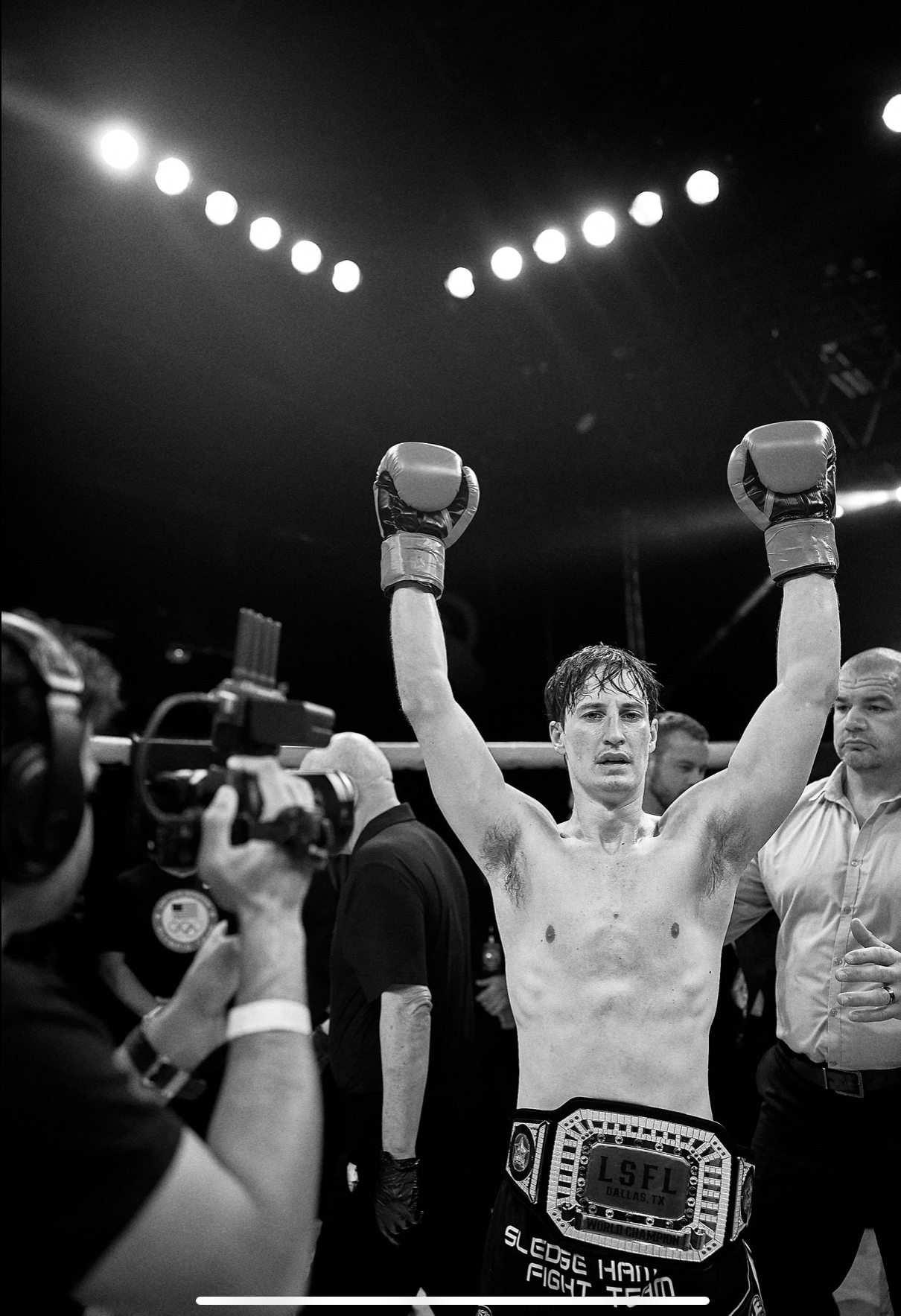 LSFL 2 champion hands raised black and white